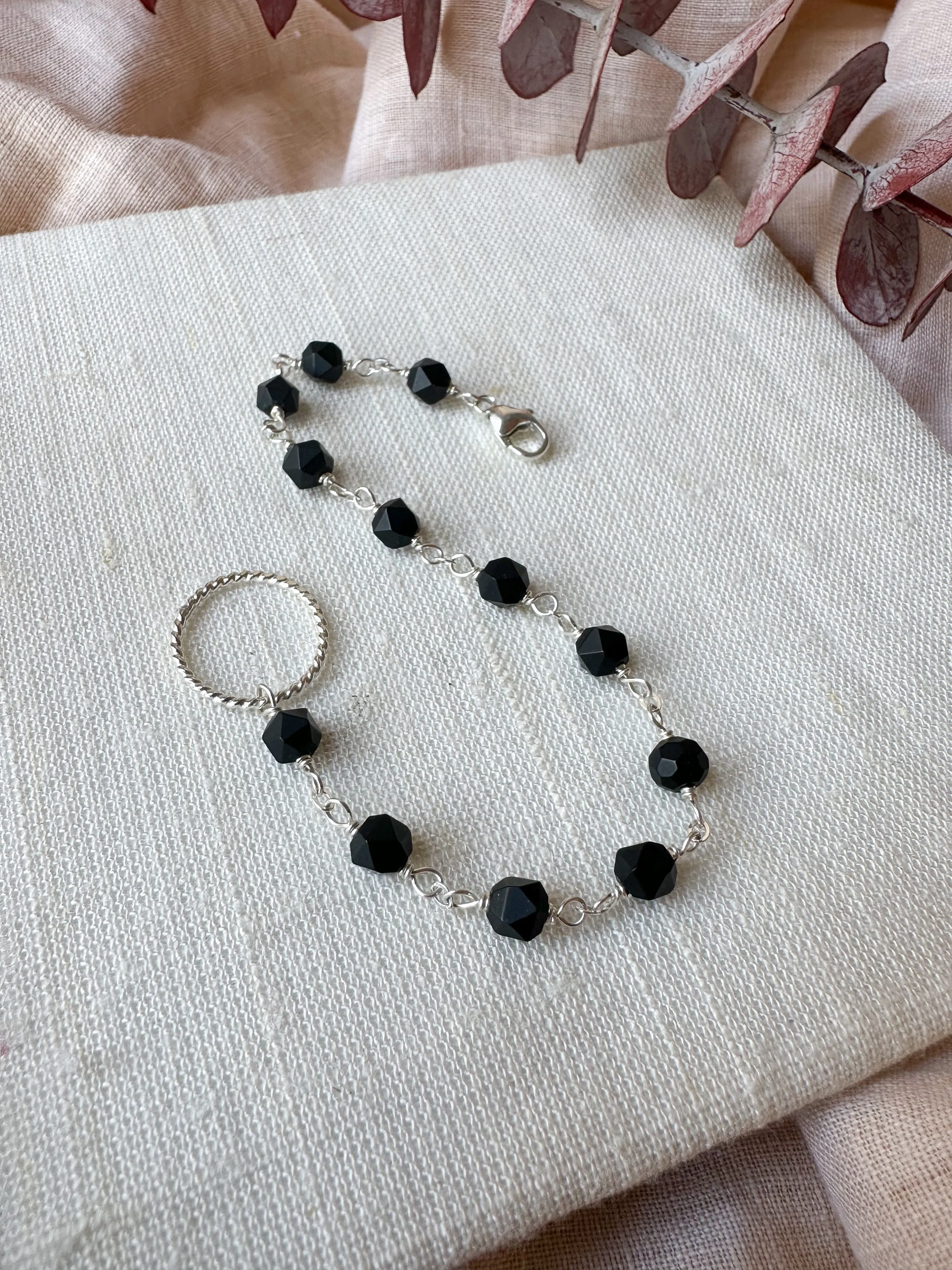 B2256 - ss forged links bracelet with faceted frosted black onyx