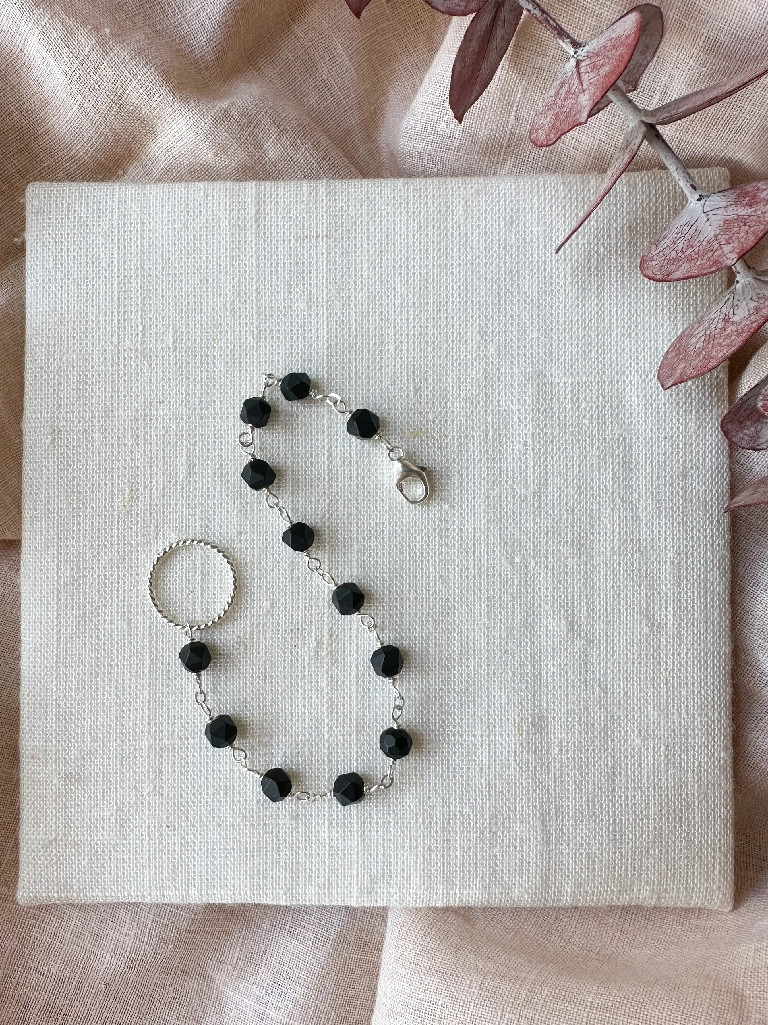 B2256 - ss forged links bracelet with faceted frosted black onyx