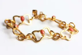 Gold Oval Link Coral Bracelet