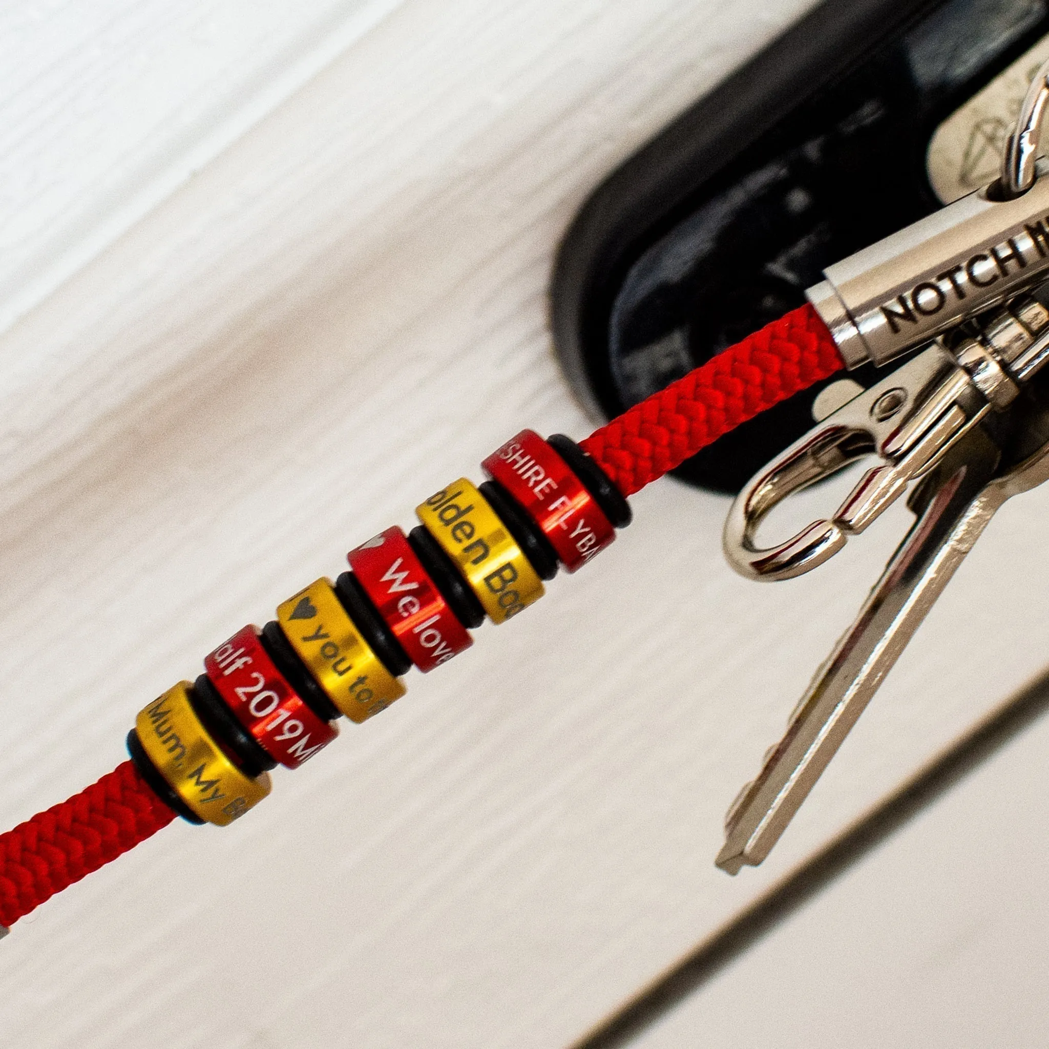 Sustainable OceanYarn NOTCH Tale - Coral with black aluminium ends